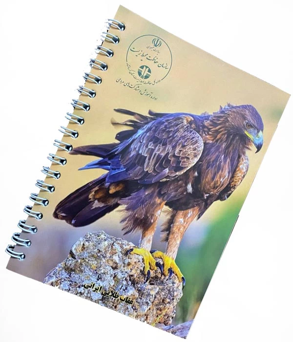 یک دفترچه یادداشت با عکس پرنده